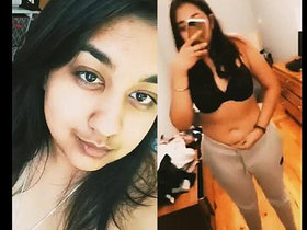 Punjabi woman displays her belly button and breasts sensually