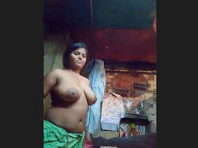 Boudi displays her large breasts