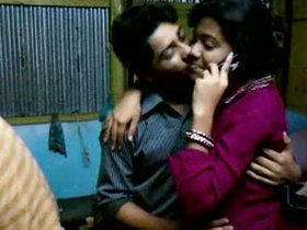 Payel and Biprojit, an Indian pair, engage in a kiss