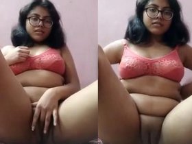 European babe indulges in self-pleasure by rubbing and fingering her vagina