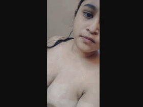 Attractive female restroom attendant performs sensually