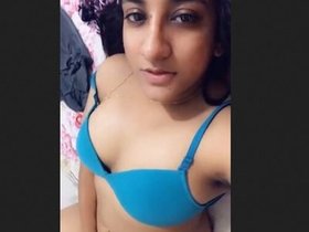 A pretty Punjabi girl flaunts her breasts and intimate parts