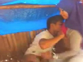 Desi couple gets intimate in a secluded hut