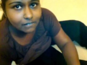 Indian woman in a hotel room