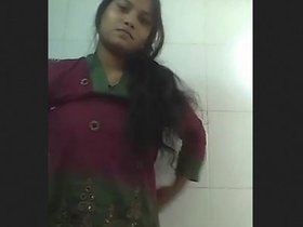 Charming brunette woman displays breasts