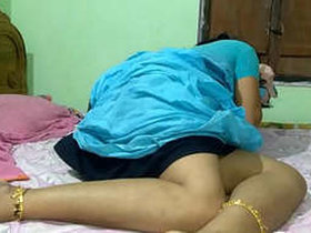 An Indian aunt has fast sex with her son's closest friend