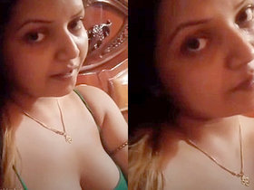 Indian girl with large breasts performs live
