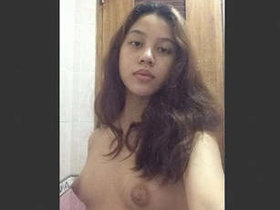 Malaysian college girl engages in oral and vaginal sex while undressed
