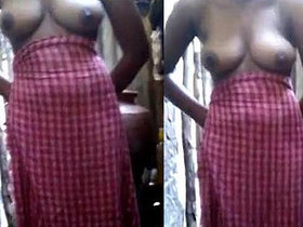 Indian girlfriend's seductive performance of nude stripping for her boyfriend