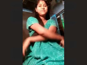 Arousing Indian woman displays her large breasts