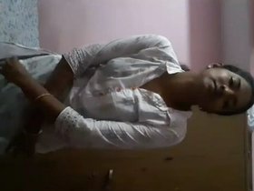 Aroused adolescent girl displays herself in the nude