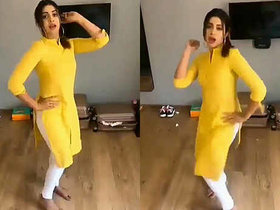 Fit Indian beauty dances sensually while pleasuring herself