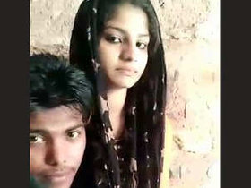 Indian village sweethearts kissing and having sex in the open air