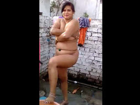 Indian beauty takes a relaxing bath