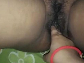 A South Asian woman pleasuring her lesbian companion with her fingers and reaching orgasm