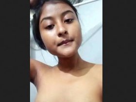 Brunette Indian teen strips down to reveal her sensual figure