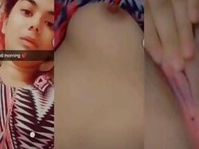 Sexy Indian beauty shows her tits and plays with her pussy during a video call