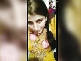 Pretty girl Desi XXX is on the phone in a sex chat with her boyfriend