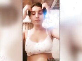 Desi beauty Topless shows off and squeezes her perfect big tits on XXX camera