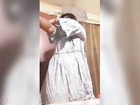 Busty and chubby Desi cutie performs XXX striptease on camera