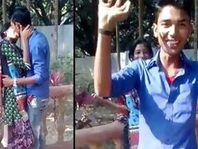 Open Desi mms clip of a slender Indian girl caught kissing her lover