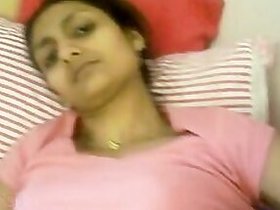 Horny Indian woman moans and jerks her pink pussy hole with her fingers