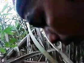 Desi Indian girl has XXX orifices fucked by guy on camera in the field