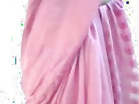 Stunning Indian chick takes off her pink sari and shows her tits