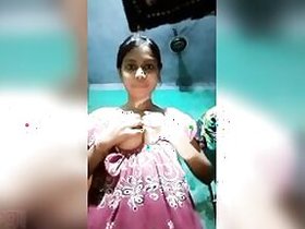 Tiny Desi exposes her big xxx tits and sexually plays with them