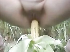 Using various things, Indian mom enjoys caressing and fucking corn