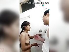 A movie scene of an Indian couple having sex in the bathroom