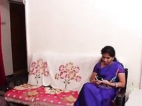 An elderly bhabhi enjoys foreplay in a Bollywood music video scene