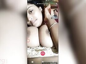 Beautiful chick Desi XXX shows her big tits on a video call