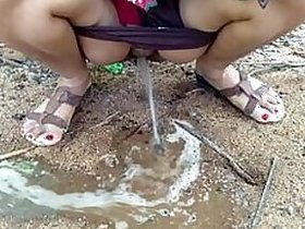 Good selection of Desi Bhabhi with big XXX tits peeing outdoors