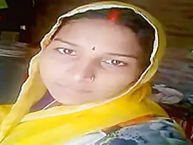 Indian lady in Dehati flaunts her wet pussy and firm tits