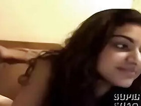 A girl who looks like an Indian actress strips naked